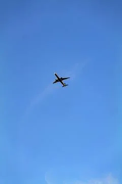 Low angle view of airplane against the sky with space for text Stock Photos