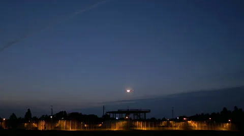 Low angle view of an airplane with headlights descending to touchdown. Stock Footage 61785455