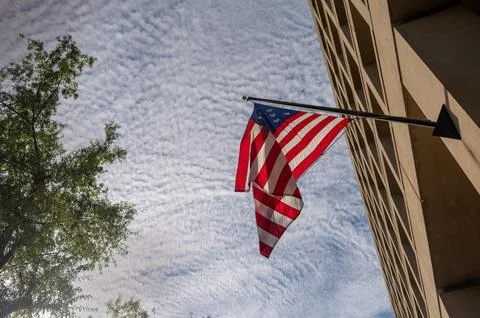 Low angle view of american flag Photos