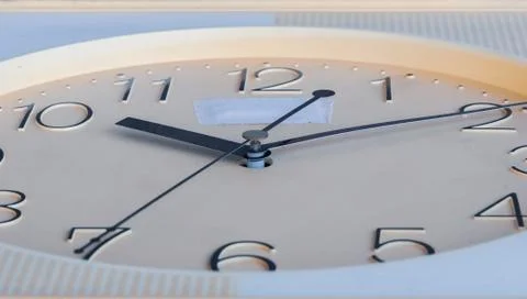Low angle view of analog clock. selective focus Stock Photos