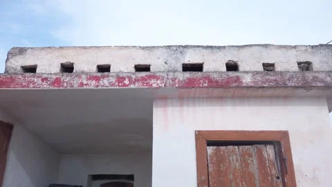 Low angle view of ancient dovecote with historic rural architecture Stockbeeldmateriaal 328110217
