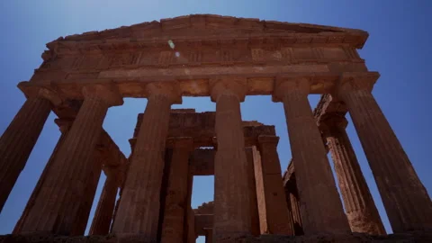 Low angle view of ancient greek temple columns in Sicily Stock Footage 330347584