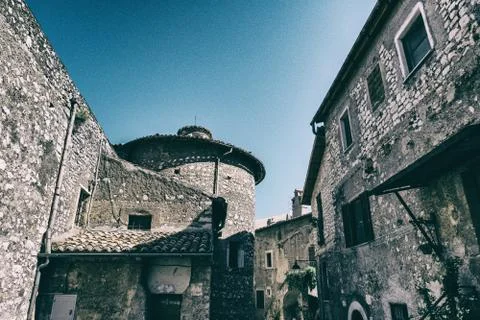 Low angle view of ancient town with blue sky in the background. Stock Photos