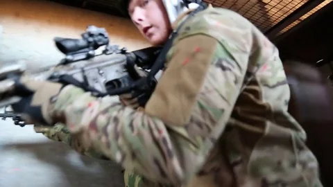 Low Angle View of Armed Trainees in Clearing a Building Stock Footage 70561942
