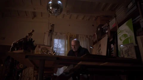 Low angle view of an artist working in the studio. Middle-aged man making cre Stock Footage 152344782