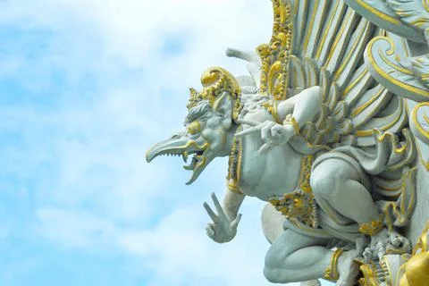 Low Angle View Artistic Garuda Or Eagle Statue With Wings On Cloudy Blue Sky Stock Photos