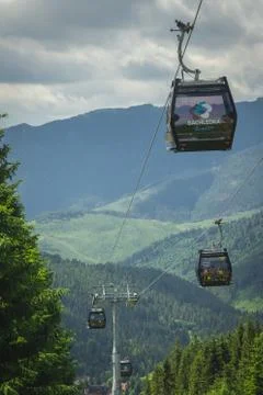 Low angle view of Bachledka Ski &amp; Sun gondola cable way at a resort in Slovak Stock Photos