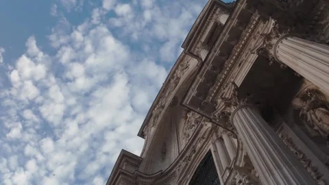 Low angle view of the baroque facade of Murcia Cathedral against a blue sky Stock Footage 337258146