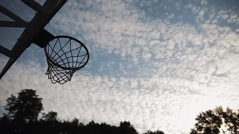 Low Angle View of Basketball Hoop and Men Hands Throwing and UnScoring at Partly Stock Footage 120726769
