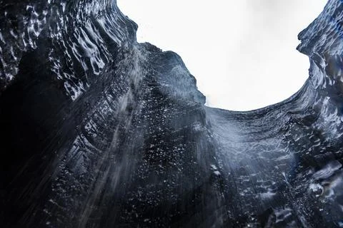 Low angle view of beautiful ice glacier on a cloudy day Stock Photos