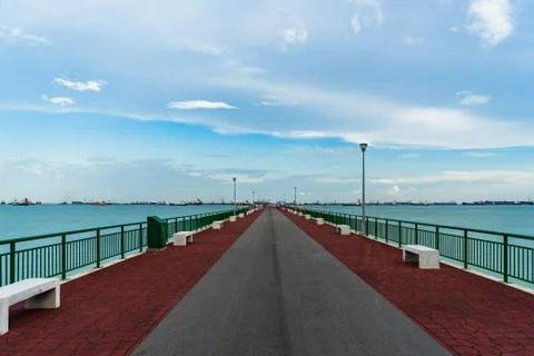 Low angle view of Bedok Jetty Singapore reaching into the sea Stock Photos