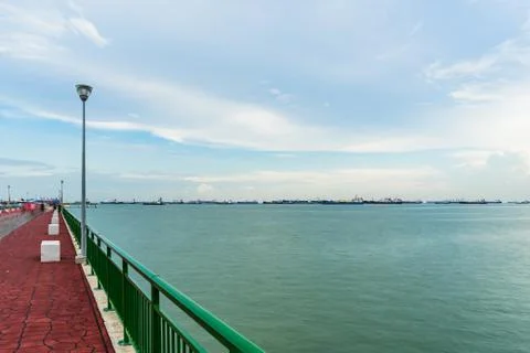 Low angle view of Bedok Jetty Singapore reaching into the sea Foto stock