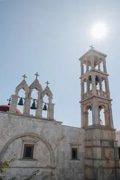 Low angle view of bell towers on Panagia Tourliani Monastery, Ana Mera, Mykon Stock Photos