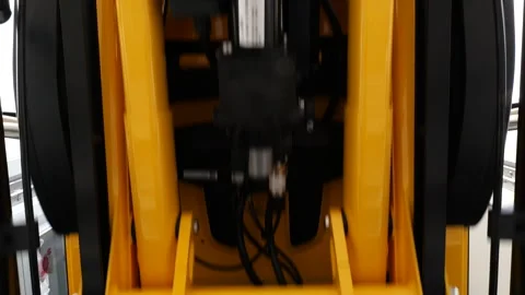 Low angle view beneath ambulance during powered stretcher unloading procedure Video stock 336429247