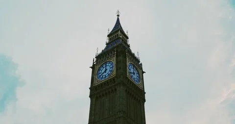 Low angle view of Big Ben Elizabeth Tower clock face in cloudy sky. Stock Footage 346680712