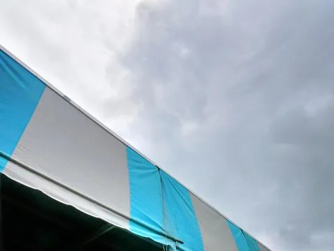 Low Angle View of Blue Gray Striped Canvas Roof of Warehouse Stock Photos