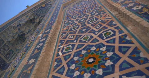 Low angle view of blue mosaic tiles on Islamic architecture facade Stock Footage 330903309