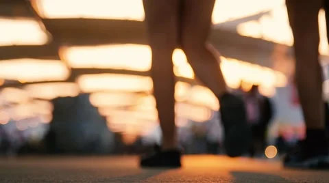 Low angle view of blurred people walking on the street. Shot in slow motion 스톡 동영상 53333445