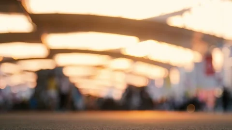 Low angle view of blurred people walking on the street. Shot in slow motion Video stock 53334393