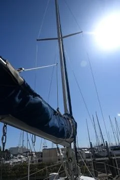 Low angle view of boom and mast against sky Stock Photos