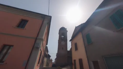 Low angle view of the brick bell tower in the sunshine Stock Footage 344254358