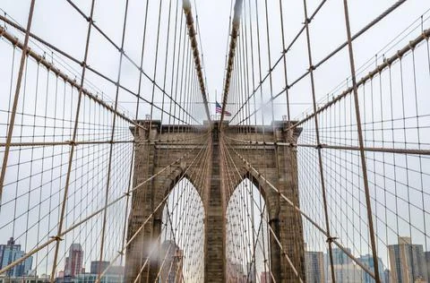 Low Angle View of Brooklyn Bridge Top on a Rainy Day in Manhattan, NYC, USA Photos