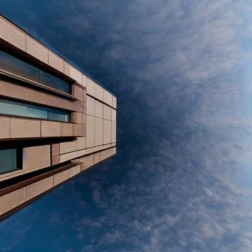 Low angle view of building against blue sky Ilustración de archivo