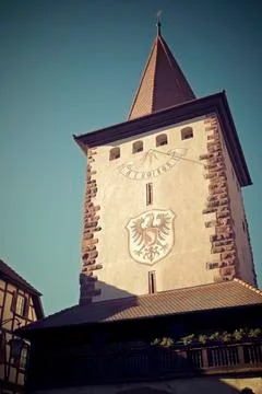 Low angle view of building exterior against clear blue sky Fotos de archivo