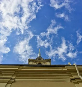 Low angle of view on the building spire. Low angle view of the old historical Stock Photos