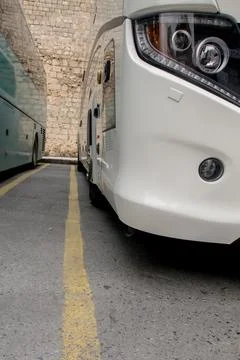 Low angle view of a bus parking lot. Close up view of bus Stock Photos