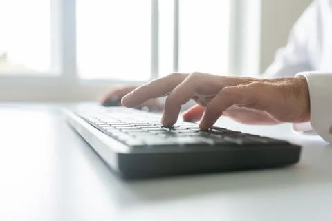 Low angle view of business programmer using computer keyboard 스톡 사진