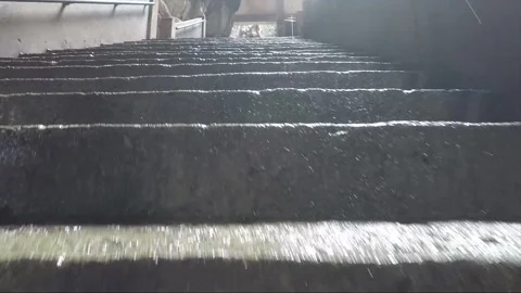 Low angle view, Camera moves upstairs inside Main Temple cave, Batu caves Stock Footage 196390945
