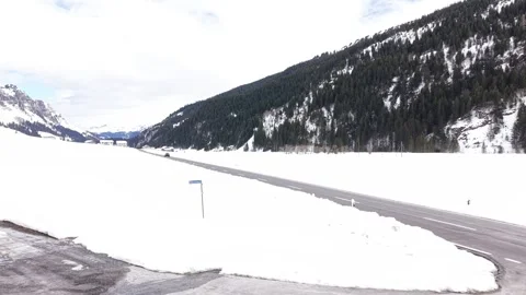 Low angle view of car on alpine road Stock Footage 332134482
