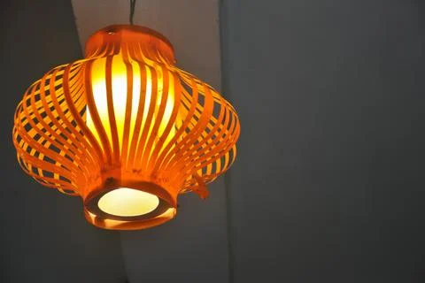 Low angle view of ceiling lamp light with copy space  Stock-Fotos