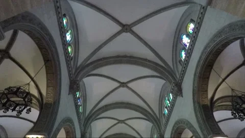 Low angle view of ceiling, Nave and Rib Vault of Dome inside Cathedral Basilica Stock Footage 202154934