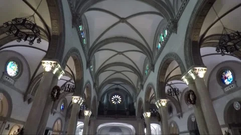 Low angle view of ceiling, Nave and Rib Vault of Dome inside Cathedral Basilica Stock Footage 202156743