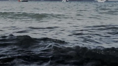 Low Angle View of Choppy Dark Sea Waves Rolling In Stock-Fotos