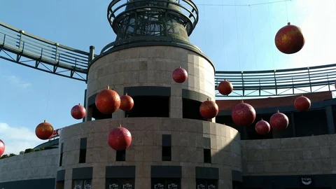 Low Angle View of Christmas Balls at Shopping Mall Stock Footage 120943389