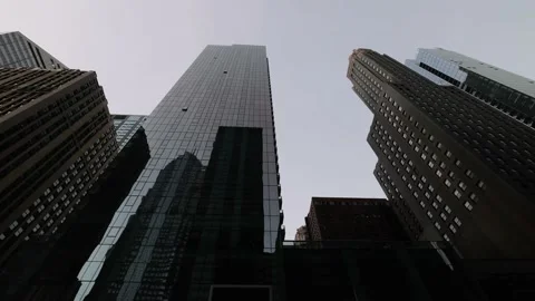 Low Angle View Of City Skyscrapers Tracking Right Stock-Footage 167738112