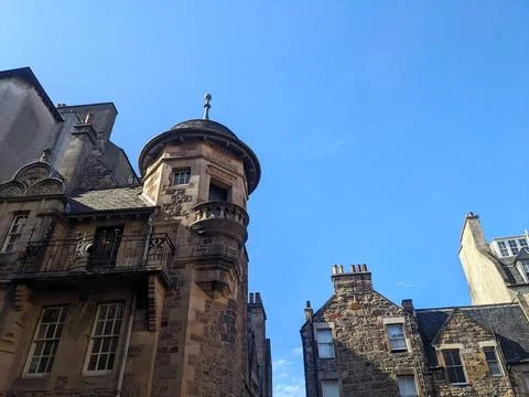 Low angle view of a classic stone turret on a historic building in Old Town Stock Photos