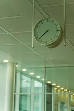 Low angle view of a clock at an airport lounge, Paris, France Stock Photos