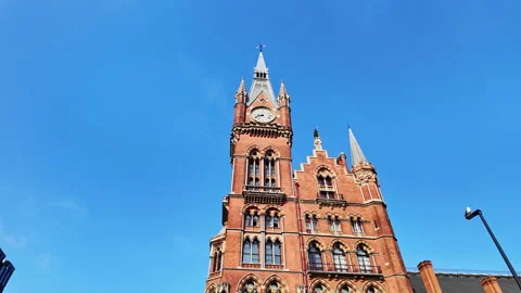 Low angle view of the clock tower at St Pancras international train station in Stock Footage 341298351