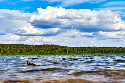 Low angle view of cloudscape and water surface Stock Photos