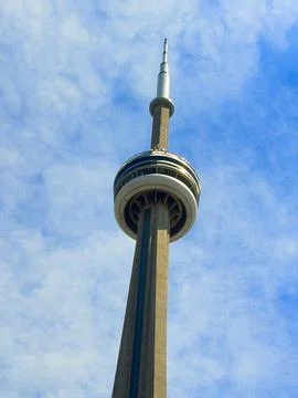 Low Angle View of CN Tower with Cloudy Blue Sky Stock Photos