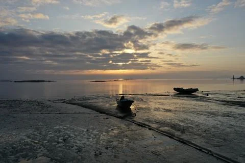 Low-Angle View of Coastal Boats on Xiamen Mudflat at Dawn Stock Photos