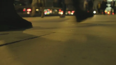 Low angle view of commuters feet at rush hour at dusk on london bridge Video stock 96363175