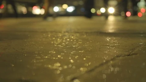 Low angle view of commuters feet as it starts to rain on london bridge Stock Footage 96369451