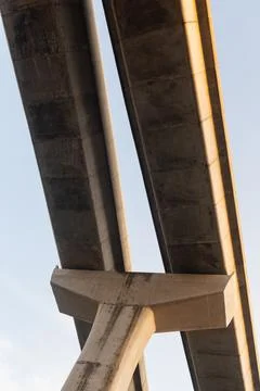 Low angle view of concrete elevated expressway structure against sky Stock Photos