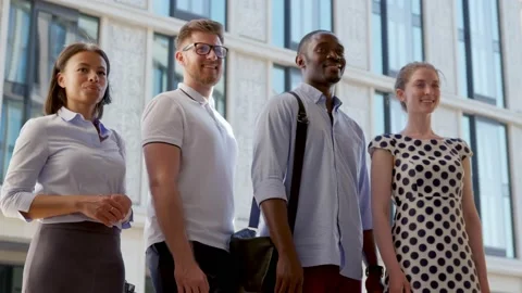 Low angle view of confident diverse business team standing outside business Stock Footage 157312739
