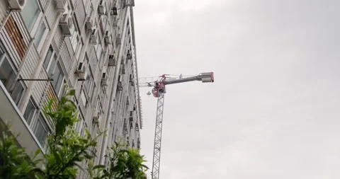 Low angle view of construction crane in Thessaloniki city center. Stock Footage 154265305